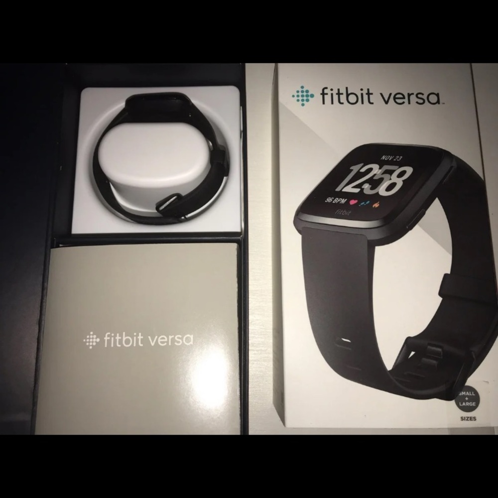 LIKE NEW Fitbit versa